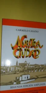 Nuestra ciudad, Carmelo Casaño, con ilustraciones de Tomás Egea, dedicado por Tomás Egea